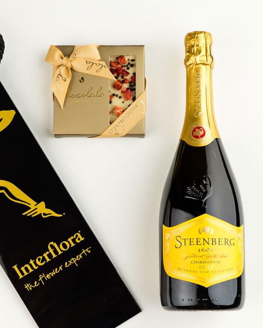 Gift bag with Steenberg sparkling wine and strawberry-champagne chocolate