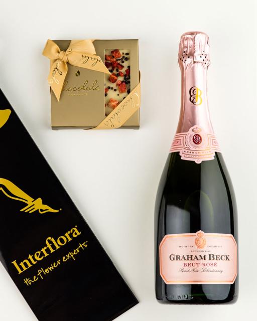 Gift bag with Graham Beck Rosé champagne and strawberry-champagne chocolate
