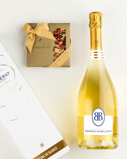 Gift bag with Besserat Blanc de Blancs champagne and strawberry-champagne chocolate