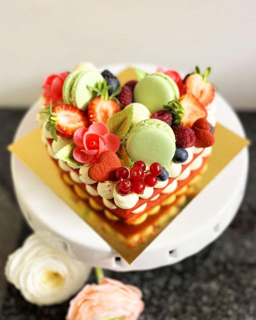 Heart-shaped cake with berries